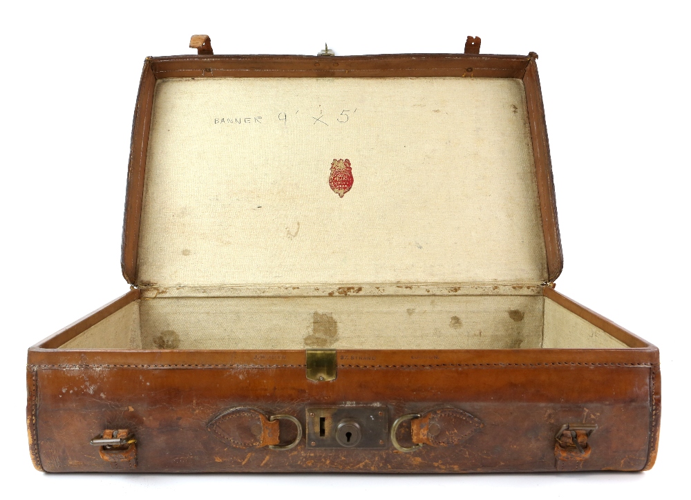 An elegant leather suitcase by Allen of 37 The Strand [maker's label in the interior lid], 61.5 x 36