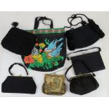 A collection of vintage bags dating from Edwardian period to 1940s to include black wool fabric