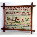 A large Sampler Home Sweet home with alphabet wool on canvas worked by Katie Jones aged 14,1914,