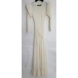 White crepe wedding dress with puffed shoulders and ruched bodice and frilled hem 1930s