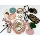 Collection of accessories including large compact with small mother of pearl inlay, atomiser, pill