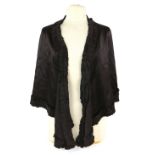 Black velvet/panne cape with tie detail to neck, 1930s, and a black satin Victorian cape with