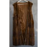 Assorted fur to include 5 fur coats-, 1 fur gilet, a red rabbit fur scarf, and black coat with fur