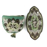 A Victorian Beadwork tea cosy on green ground, and beaded floral stand with ebonised and gilt
