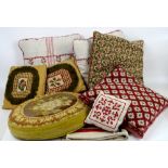 Collection of 14 decorative cushions in various fabrics some tapestry covered in pale colours and