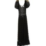 1930s black net evening dress with polka dots, puffed sleeves, very full skirt and applique lace