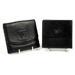 Two vintage Chanel medium sized black purse wallets, one in “caviar “ , the other in textured