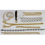 Quantity of 8 belts 1980s and earlier in a variety of materials including white and gilt metal,
