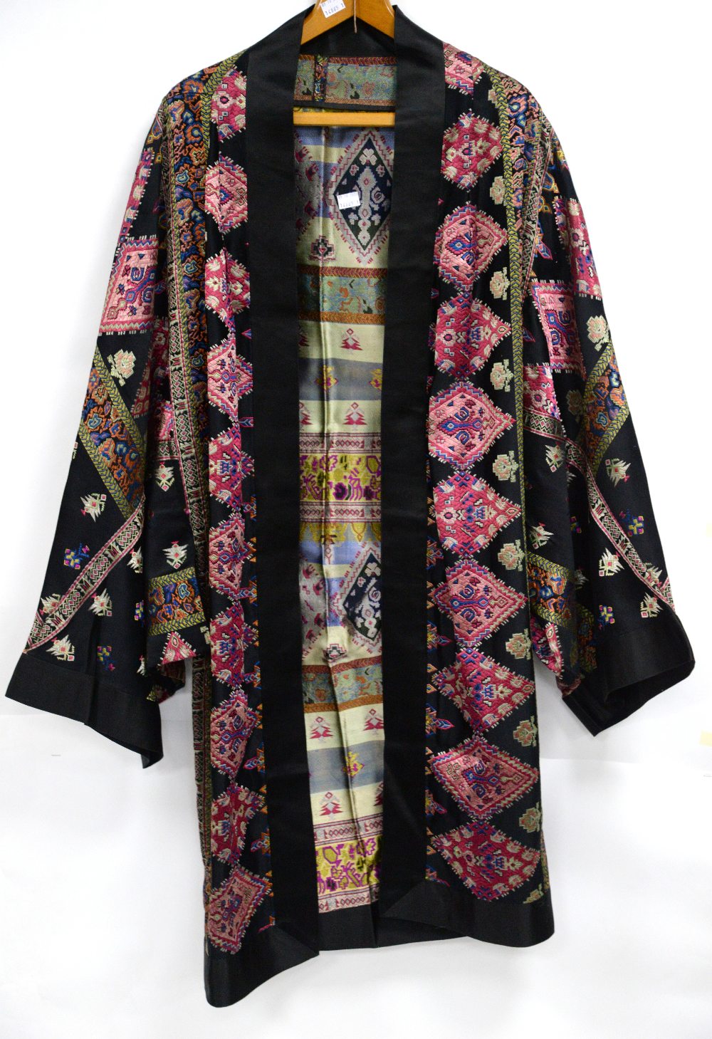 A 1920s Kimono style silk dressing gown with floral and foliate print on a black ground, peach - Image 2 of 2