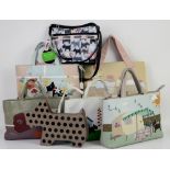 6 Radley signature handbags and 1 sports sack comprising Radley Watering flowers with purse and dust