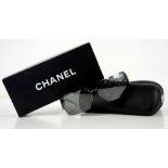 Chanel black sunglasses with diamanté panels to arms featuring crossed C’s logo and frameless mirror