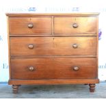 Late 19th century mahogany chest of two short over two long drawers on turned feet. 107W x 95H x 48D