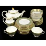 Royal Doulton English Renaissance dinner service with gilt pattern on pale green banded rim, white