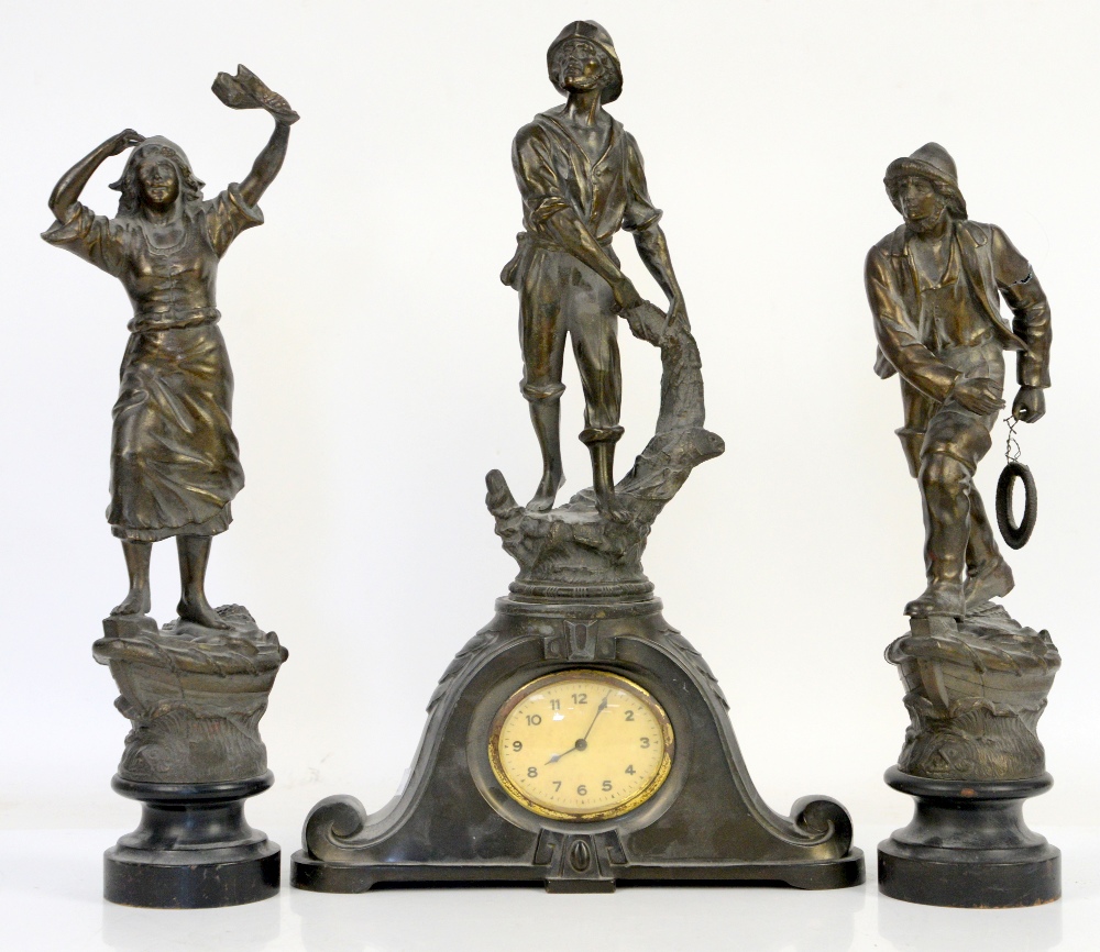 Late 19th/early 20th century French patinated spelter clock garniture modelled with a fisherman