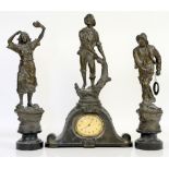 Late 19th/early 20th century French patinated spelter clock garniture modelled with a fisherman