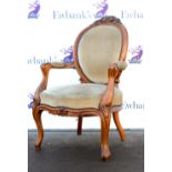 20th century mahogany French open armchair with oval backrest, and scrolled armrests and cabriole