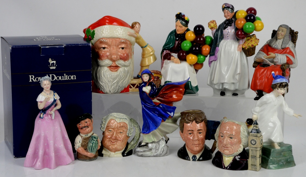 Collection of eleven Royal Doulton figures and jugs,
