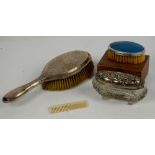 Boxed silver brush and comb christening set, a silver topped trinket dish and a silver backed brush