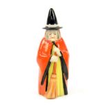 Royal Worcester candle snuffer in the form of a witch, circa 1920, puce marks Overall condition