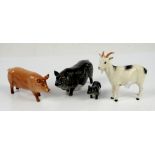 Royal Doulton 3 ceramic pigs and a goat (4 in lot)