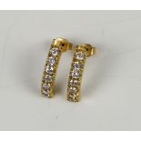 Cubic zirconia set crescent half hoop drop earrings, set in 9 ct yellow gold, Sheffield hallmark,