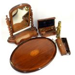 A mahogany toilet mirror, 52cm high, a two handled mahogany oval tray 59cm wide overall, a brass