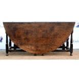 19th century oak gateleg wake table on turned legs and bun feet. 75H x 187W x 165D