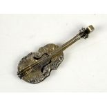 800 grade continental silver model of a violin with embossed decoration