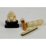 Three ivory items including an 18th century apple corer, a 19th century fruit knife and a carved
