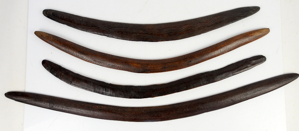 Collection of four Australian Aboriginal boomerangs, largest 95cm long