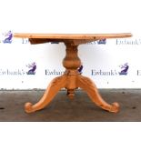 20th century pine breakfast table, column support and trefoil base. 76H x 123 Diameter