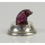 Silver paperweight mounted with an amethyst coloured glass model of a pig with silver collar, by