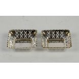 Pair of square form pierced silver dishes, B'ham 1925