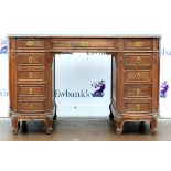 19th/20th century mahogany kidney shaped desk with three drawers to top above eight drawers on