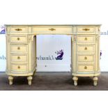 19th/20th painted kidney shaped desk with one long drawer between two sets of five short drawers