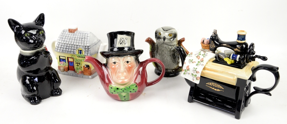 A collection of 32 teapots to include Carlton Ware, Royal Doulton and Tony Wood