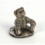 Country Artists silver model of a seated bear holding its feet