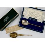 Cased Mappin & Webb silver seal top spoon and a cased gilt anointing spoon by Wakeley & Wheeler,