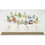 A collection of 13 various candle snuffers by Royal Worcester in the form of head and shoulders,