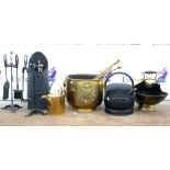 Brass coal bucket and scuttle together with a brass jug, black painted scuttle and other metal ware.