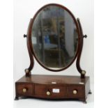 19th century mahogany toilet mirror crossbanded border above three drawers on ogee bracket feet. 60H