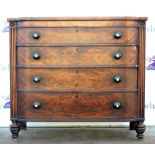 19th century mahogany bow fronted chest of four graduated drawers and turned front supports. 123W