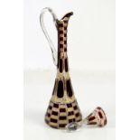 Bohemian cut glass decanter with stopper, in clear and ruby glass with gilded floral decoration,