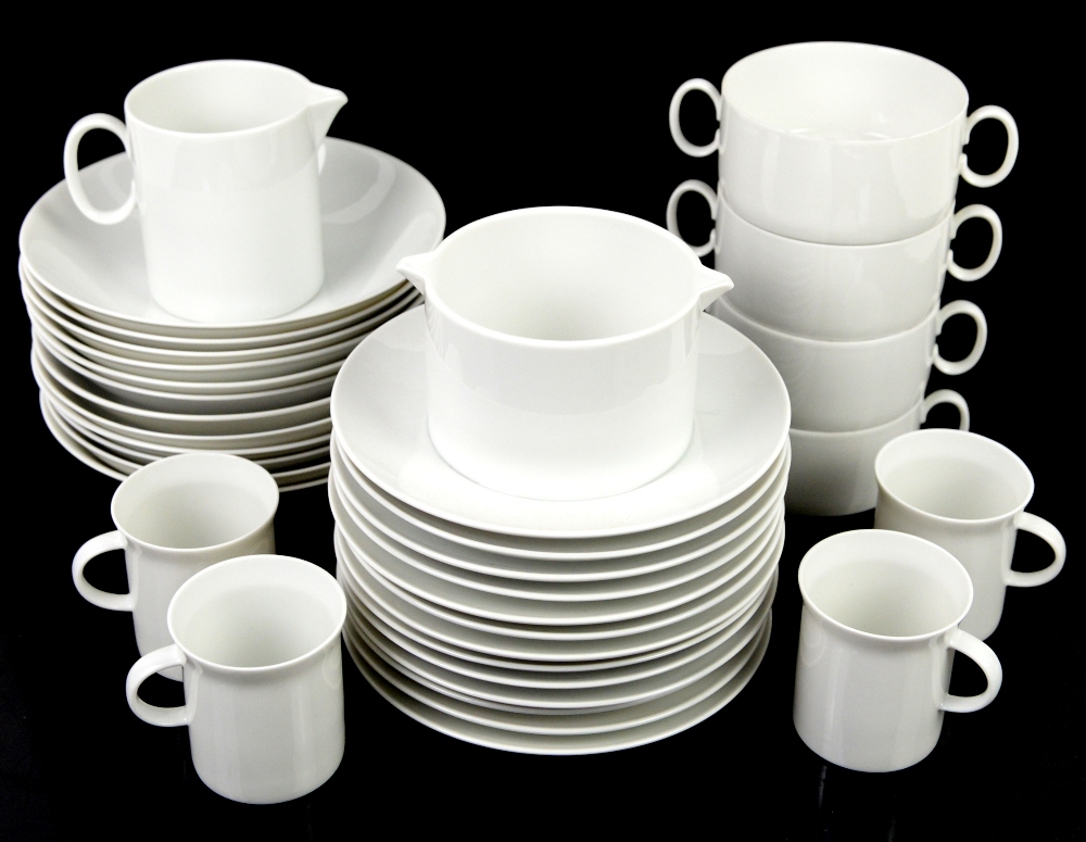 Rosenthal or Thomas white dinner wares to include 12 cups, 12 soup bowls, bowls, and side plates,