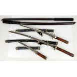 Three reproduction Japanese swords and two Kendo-style fighting sticks (5)