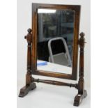 18th century style oak rectangular toilet mirror on turned column support, cabriole legs. 60H