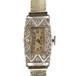 Art Deco Movado diamond set watch, cream square dial with Arabic numerals, case testing as 18 ct,