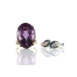 1960's cocktail ring, set oval cut amethyst, estimated weight 24.72 carats, mounted in 9 ct,