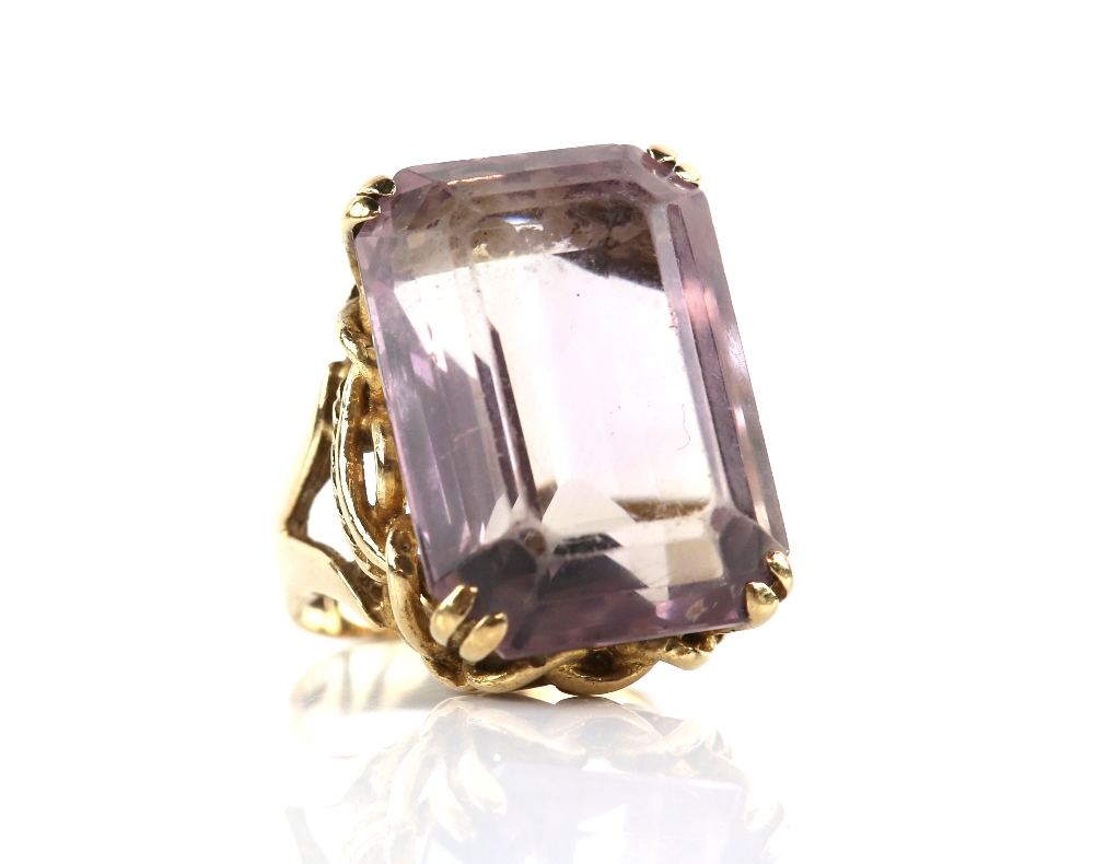 Amethyst cocktail ring, rectangular step cut amethyst weighing an estimated 27.67 carats, in a - Image 2 of 3
