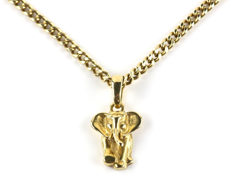 Gold elephant pendant, with articulated bail, 3.2 x 1.8cm, stamped 18 ct and a flat curb link chain,